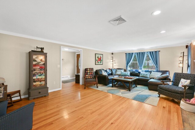 1028 Mountain Rd, Suffield, CT 06093 - living room with light wood finished floors, ornamental molding, recessed lighting, and baseboard heating