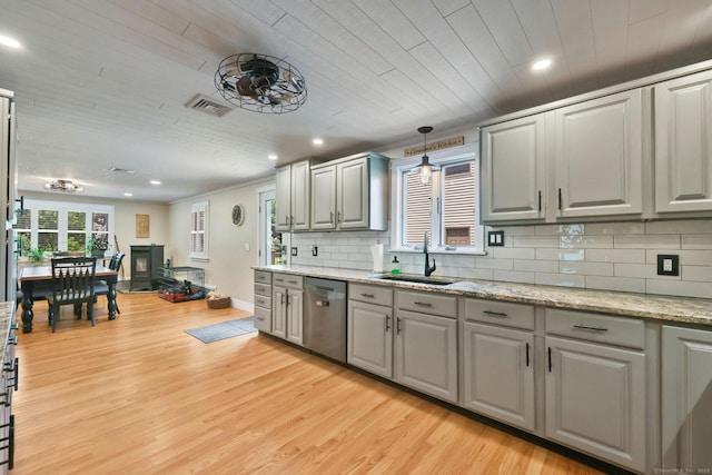 1028 Mountain Rd, Suffield, CT 06093 - kitchen featuring stainless steel dishwasher, gray cabinets, recessed lighting, tasteful backsplash, and light wood-style floors