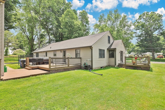 1028 Mountain Rd, Suffield, CT 06093 - back of property with a deck, a lawn, and roof with shingles