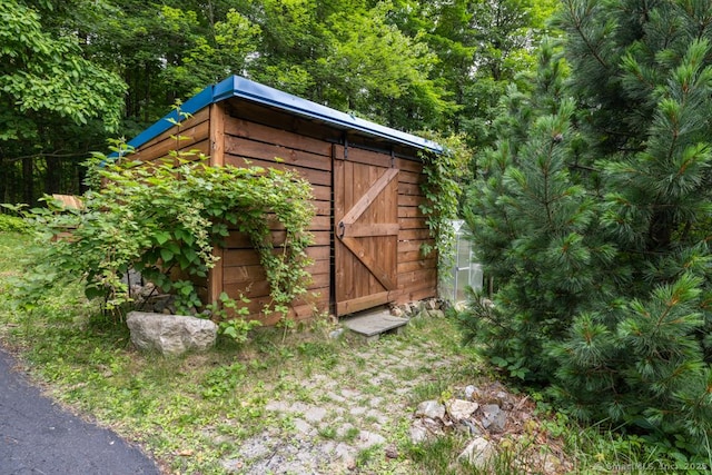 96 Pine Mountain Rd, Ridgefield, CT 06877 - view of shed featuring a wooded view