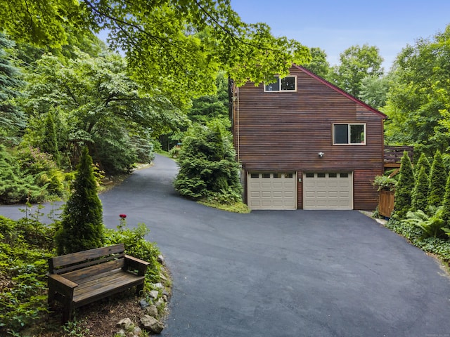 96 Pine Mountain Rd, Ridgefield, CT 06877 - view of side of property featuring driveway and a garage