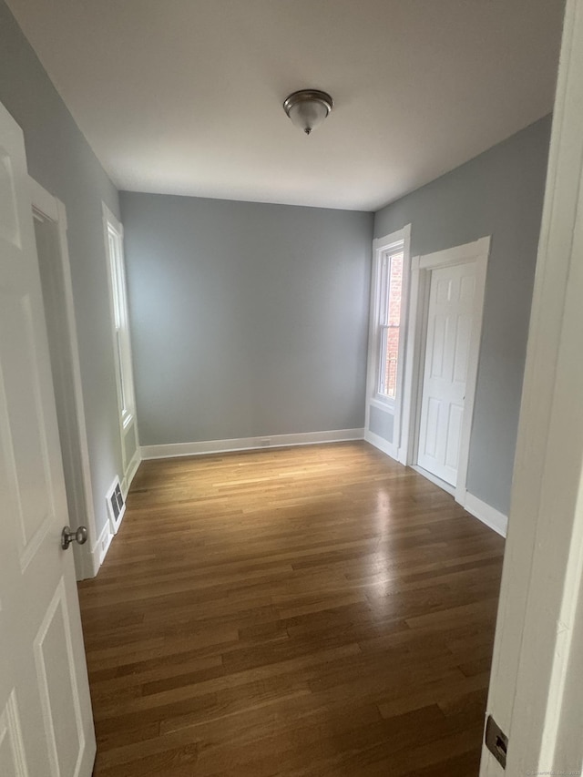 18 Pine St, Waterbury, CT 06710 - spare room featuring wood finished floors and baseboards