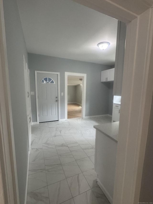 18 Pine St, Waterbury, CT 06710 - hall featuring light marble finish flooring and baseboards
