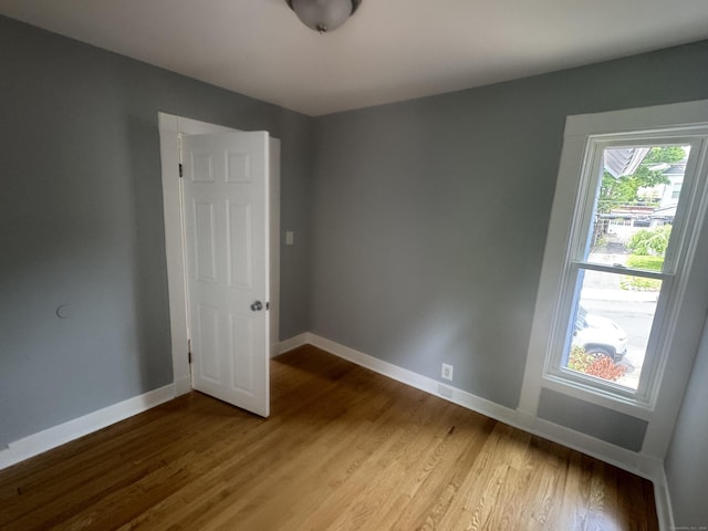 18 Pine St, Waterbury, CT 06710 - spare room with baseboards and wood finished floors