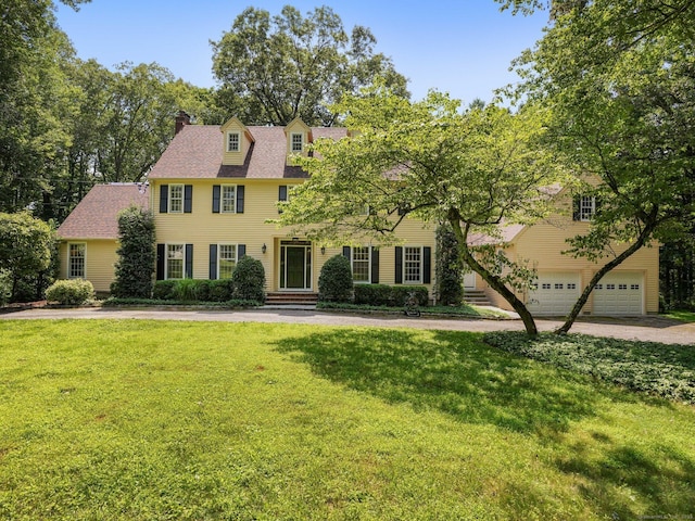 5 September Ln, Weston, CT 06883 - colonial house with a chimney, a front lawn, and driveway