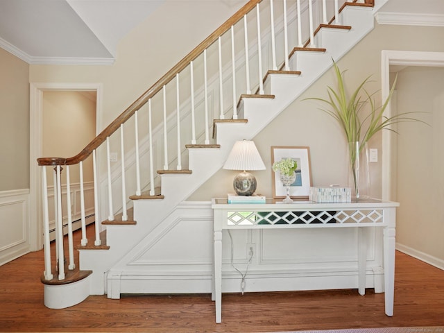 5 September Ln, Weston, CT 06883 - stairs featuring a baseboard radiator, wood finished floors, crown molding, and vaulted ceiling