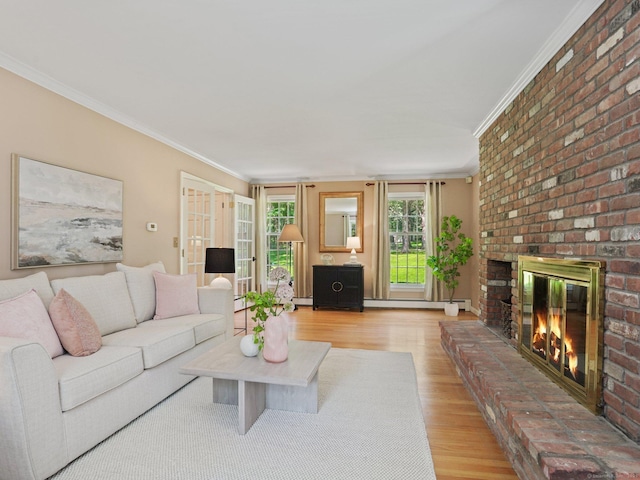 5 September Ln, Weston, CT 06883 - living room with crown molding, a brick fireplace, light wood-type flooring, and a baseboard heating unit