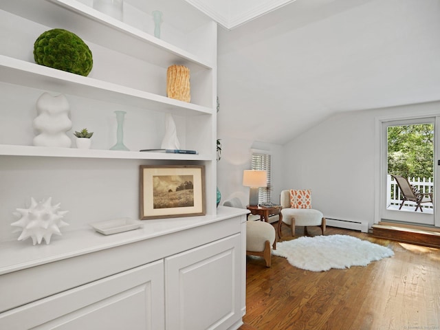 5 September Ln, Weston, CT 06883 - sitting room with baseboard heating, wood finished floors, and vaulted ceiling