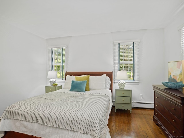 5 September Ln, Weston, CT 06883 - bedroom featuring a baseboard heating unit and wood finished floors