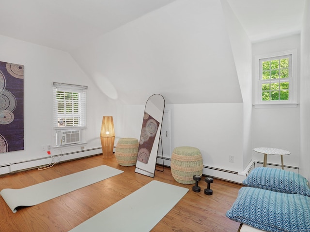 5 September Ln, Weston, CT 06883 - exercise room featuring lofted ceiling, wood finished floors, and a baseboard heating unit