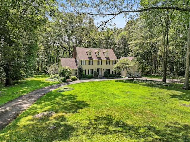 5 September Ln, Weston, CT 06883 - colonial home featuring a front lawn and driveway