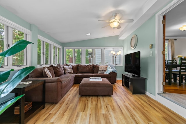 50 Carroll Rd, Hamden, CT 06517 - living room with vaulted ceiling, light wood-style flooring, a ceiling fan, and healthy amount of natural light