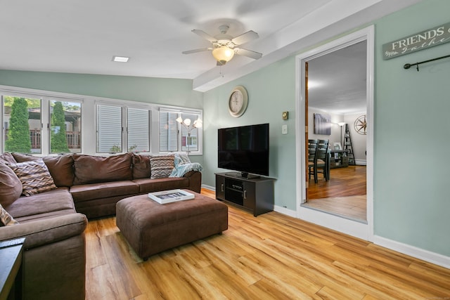 50 Carroll Rd, Hamden, CT 06517 - living area featuring lofted ceiling, wood finished floors, and ceiling fan