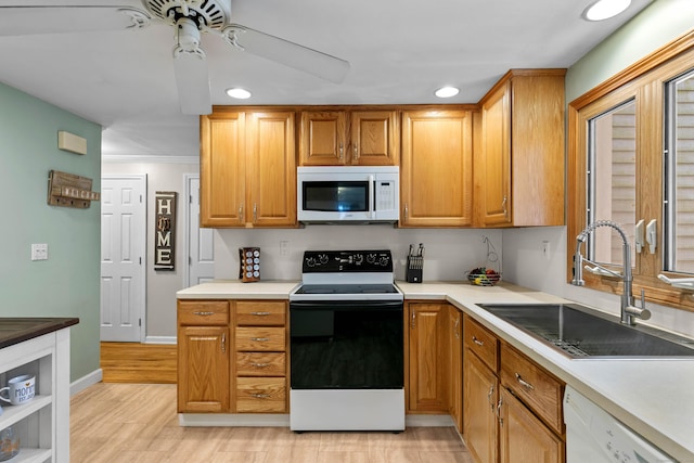 50 Carroll Rd, Hamden, CT 06517 - kitchen with white appliances, a ceiling fan, recessed lighting, light wood-type flooring, and light countertops