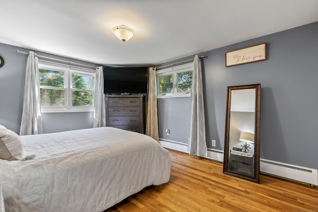 50 Carroll Rd, Hamden, CT 06517 - bedroom with a baseboard radiator and wood finished floors