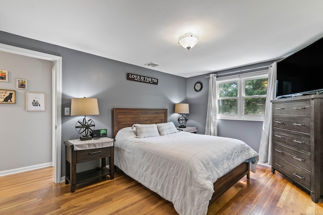 50 Carroll Rd, Hamden, CT 06517 - bedroom with baseboards and wood finished floors