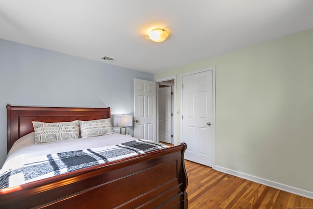 50 Carroll Rd, Hamden, CT 06517 - bedroom with baseboards and wood finished floors