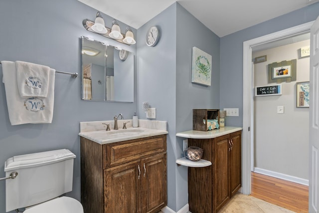 50 Carroll Rd, Hamden, CT 06517 - bathroom with vanity and wood finished floors