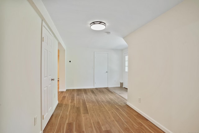 1198 New Haven Ave, Milford, CT 06460 - hall with light wood-style flooring and baseboards