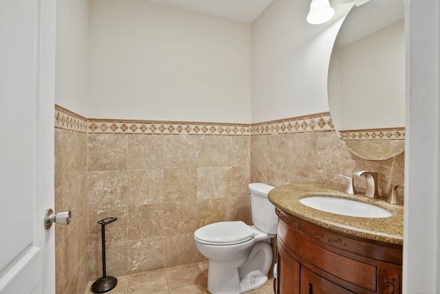 1198 New Haven Ave, Milford, CT 06460 - bathroom with vanity, wainscoting, and tile walls
