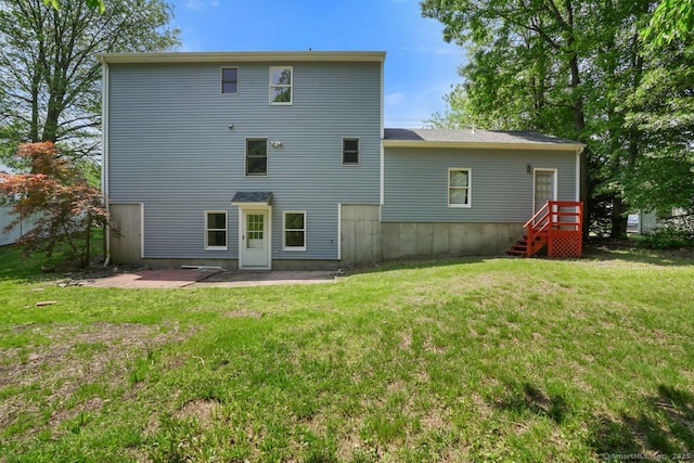 1198 New Haven Ave, Milford, CT 06460 - rear view of property featuring a yard and a patio