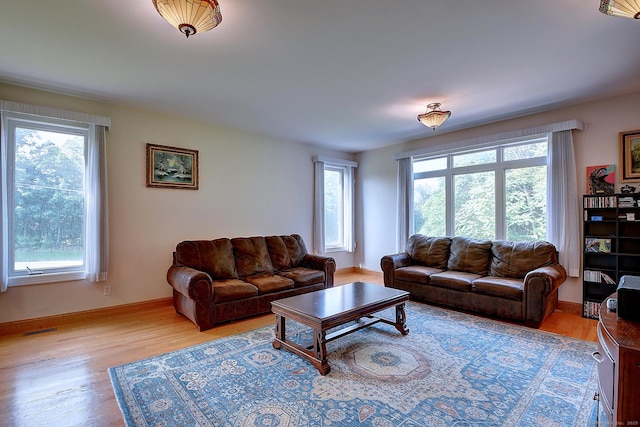 125 Waverly Dr, Newington, CT 06111 - living room with light wood-type flooring and baseboards