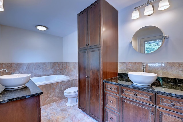 125 Waverly Dr, Newington, CT 06111 - full bath featuring vanity, a bath, tile patterned floors, and decorative backsplash