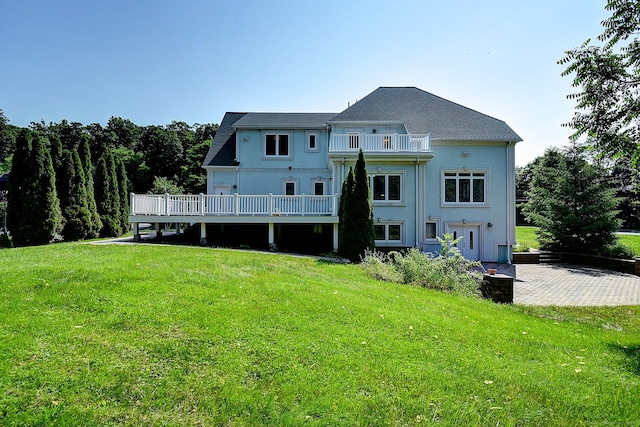 125 Waverly Dr, Newington, CT 06111 - back of property featuring a balcony and a lawn