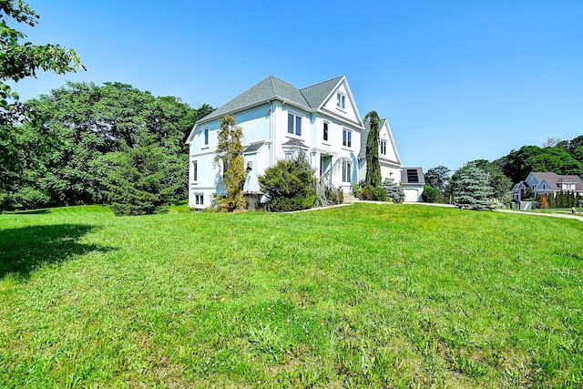 125 Waverly Dr, Newington, CT 06111 - view of home's exterior featuring a yard and stucco siding