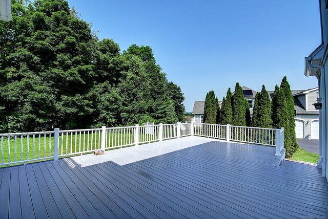 125 Waverly Dr, Newington, CT 06111 - wooden deck featuring a lawn
