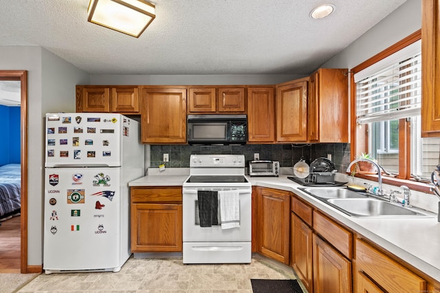 115 Town Farm Rd, East Haddam, CT 06423 - kitchen featuring white appliances, brown cabinetry, light countertops, decorative backsplash, and a textured ceiling