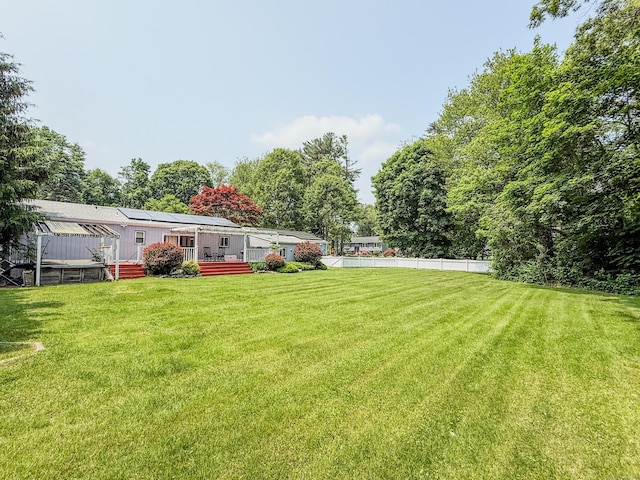 143 Soundview Ave, Shelton, CT 06484 - view of green lawn featuring a wooden deck
