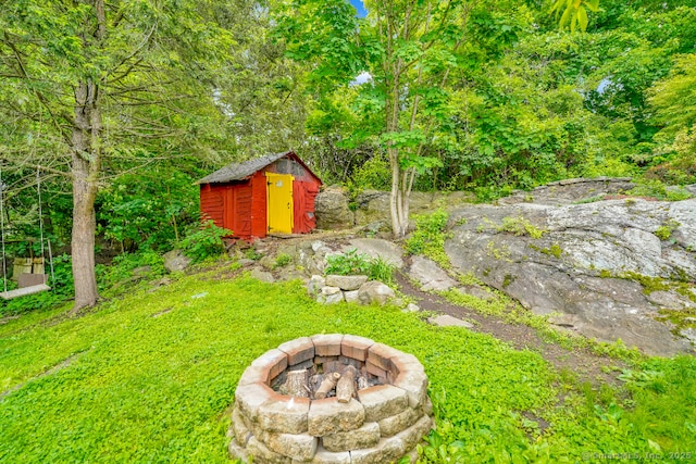 350 S Main St, Naugatuck, CT 06770 - view of yard featuring a shed and an outdoor fire pit