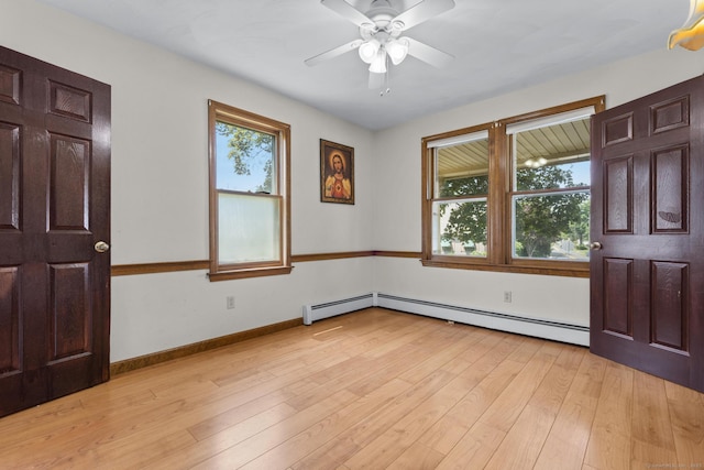 27 Homestead St, Manchester, CT 06042 - foyer entrance featuring a ceiling fan, light wood-type flooring, and a baseboard radiator