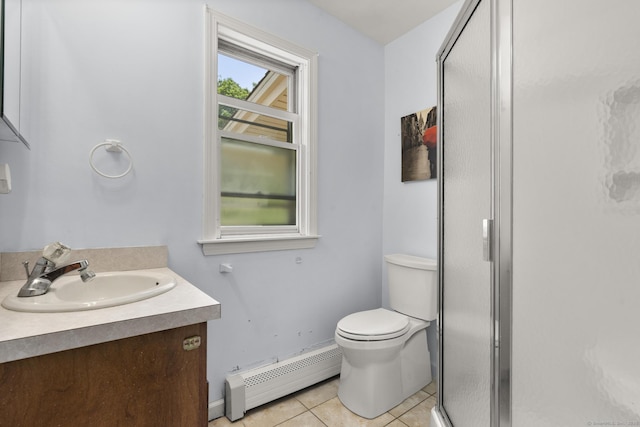 27 Homestead St, Manchester, CT 06042 - full bath with a baseboard heating unit, vanity, tile patterned floors, and a shower stall
