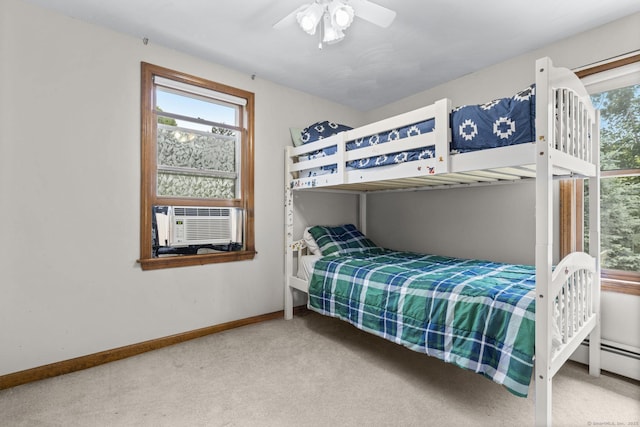 27 Homestead St, Manchester, CT 06042 - carpeted bedroom with multiple windows, cooling unit, ceiling fan, and a baseboard radiator