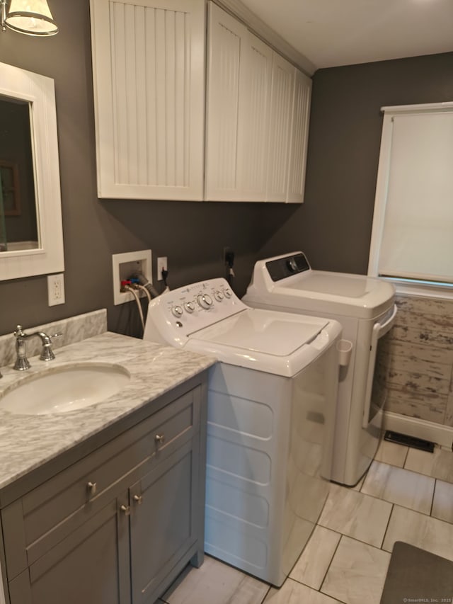 42 Meadowlark Rd, Enfield, CT 06082 - laundry room with washer and dryer and cabinet space