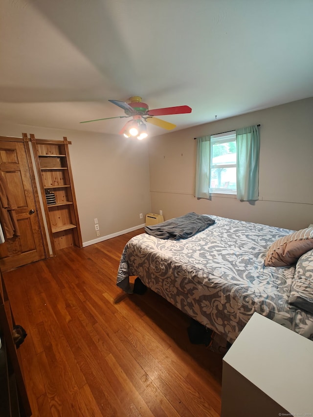 42 Meadowlark Rd, Enfield, CT 06082 - bedroom featuring dark wood-style floors and a ceiling fan