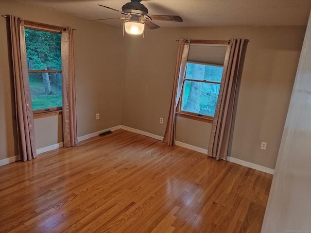 42 Meadowlark Rd, Enfield, CT 06082 - empty room with ceiling fan and light wood finished floors