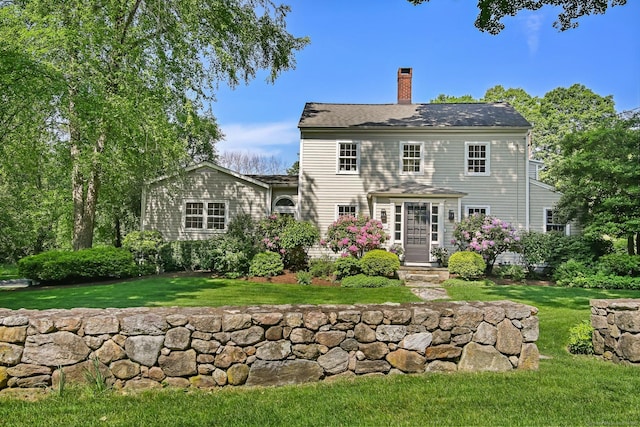 52 Wilton Rd E, Ridgefield, CT 06877 - rear view of property with a chimney and a yard