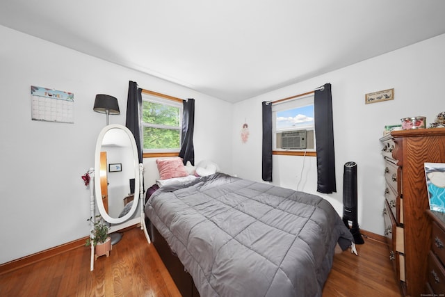59 Litchfield Ln, Bristol, CT 06010 - bedroom featuring cooling unit and wood finished floors
