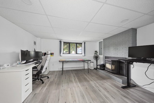 59 Litchfield Ln, Bristol, CT 06010 - office space with baseboard heating, a drop ceiling, and light wood-style floors