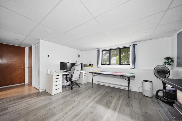 59 Litchfield Ln, Bristol, CT 06010 - office featuring a paneled ceiling, baseboard heating, and wood finished floors
