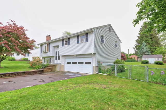 59 Litchfield Ln, Bristol, CT 06010 - split foyer home featuring an attached garage, driveway, and a chimney