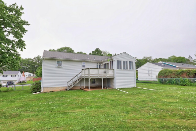 59 Litchfield Ln, Bristol, CT 06010 - rear view of property with stairs, a sunroom, and a deck