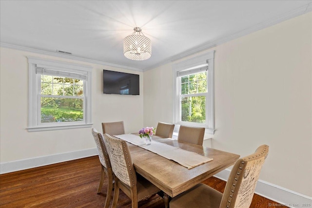 203 Ridgewood Ave, Hamden, CT 06517 - dining space featuring ornamental molding, wood finished floors, and a chandelier
