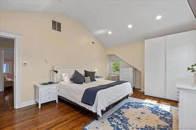 203 Ridgewood Ave, Hamden, CT 06517 - bedroom with radiator heating unit, wood finished floors, recessed lighting, and high vaulted ceiling