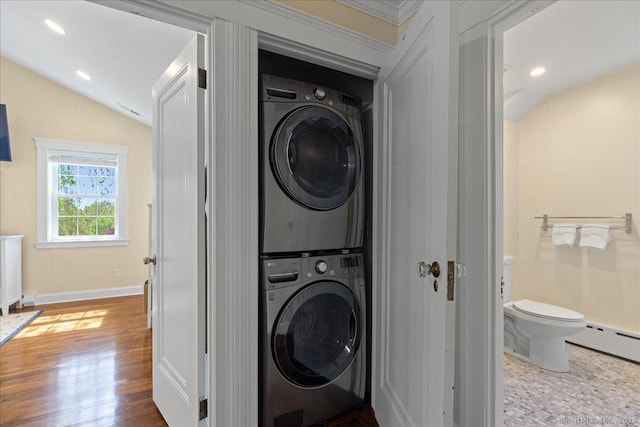 203 Ridgewood Ave, Hamden, CT 06517 - washroom featuring stacked washer and clothes dryer, a baseboard radiator, recessed lighting, and wood finished floors