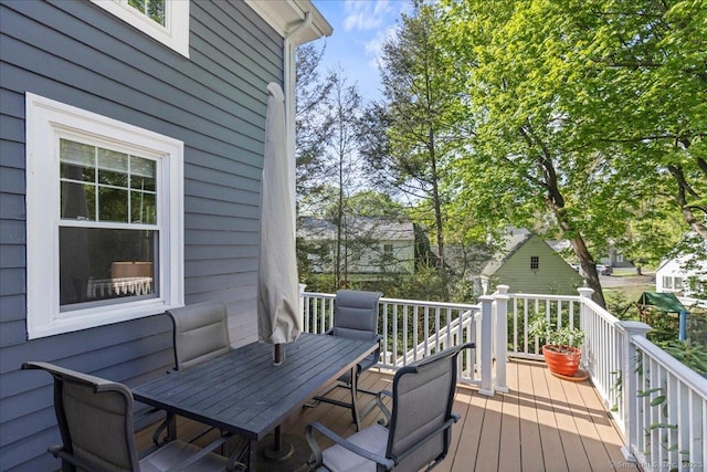 203 Ridgewood Ave, Hamden, CT 06517 - wooden terrace with outdoor dining area