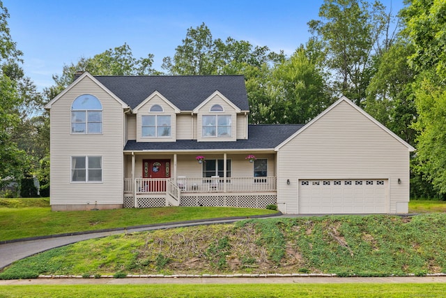 119 NW Dr, Plainville, CT 06062 - traditional home with a porch, a front yard, a garage, and driveway